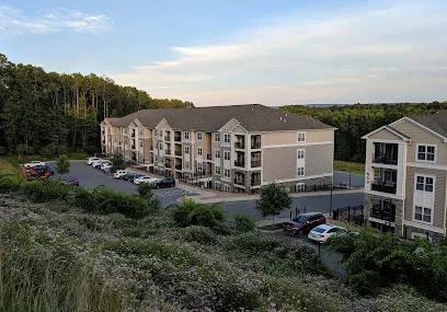 Logo of Highwoods at Toftrees Apartments