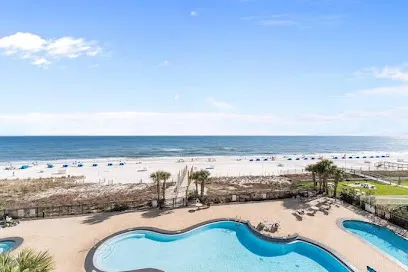 Logo of Palacio Condo Rentals in Perdido Key by Vacasa